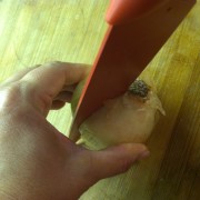 Cut the onion in half from end to end.
